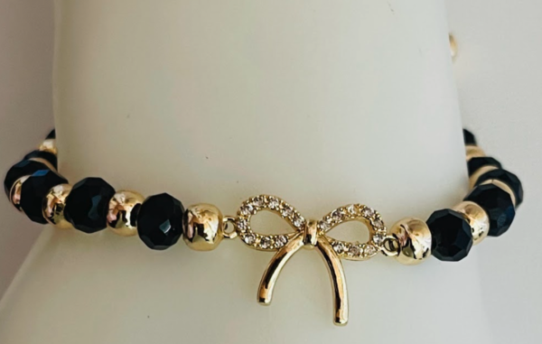 Pulsera moño piedra negra