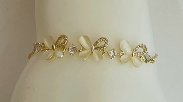 Pulsera adjustable con mariposas y brillantes